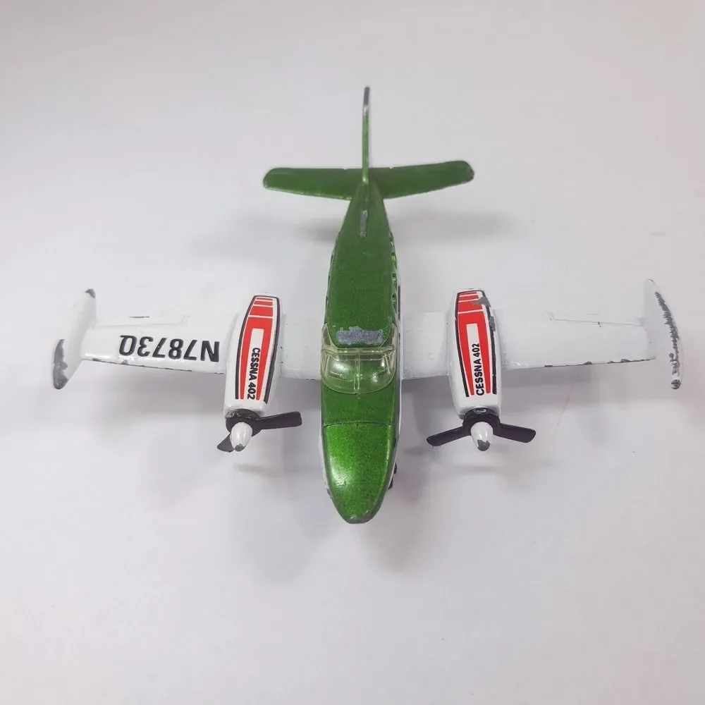 MATCHBOX Sky Busters 1974 SP9 Cessna 402 plane Airplane Macau Diecast green